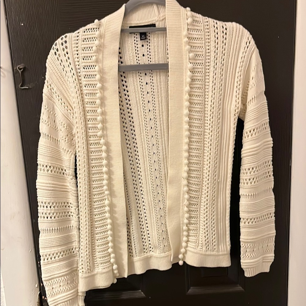 Cream Cardigan with Open Knit Design and Ribbed Edges